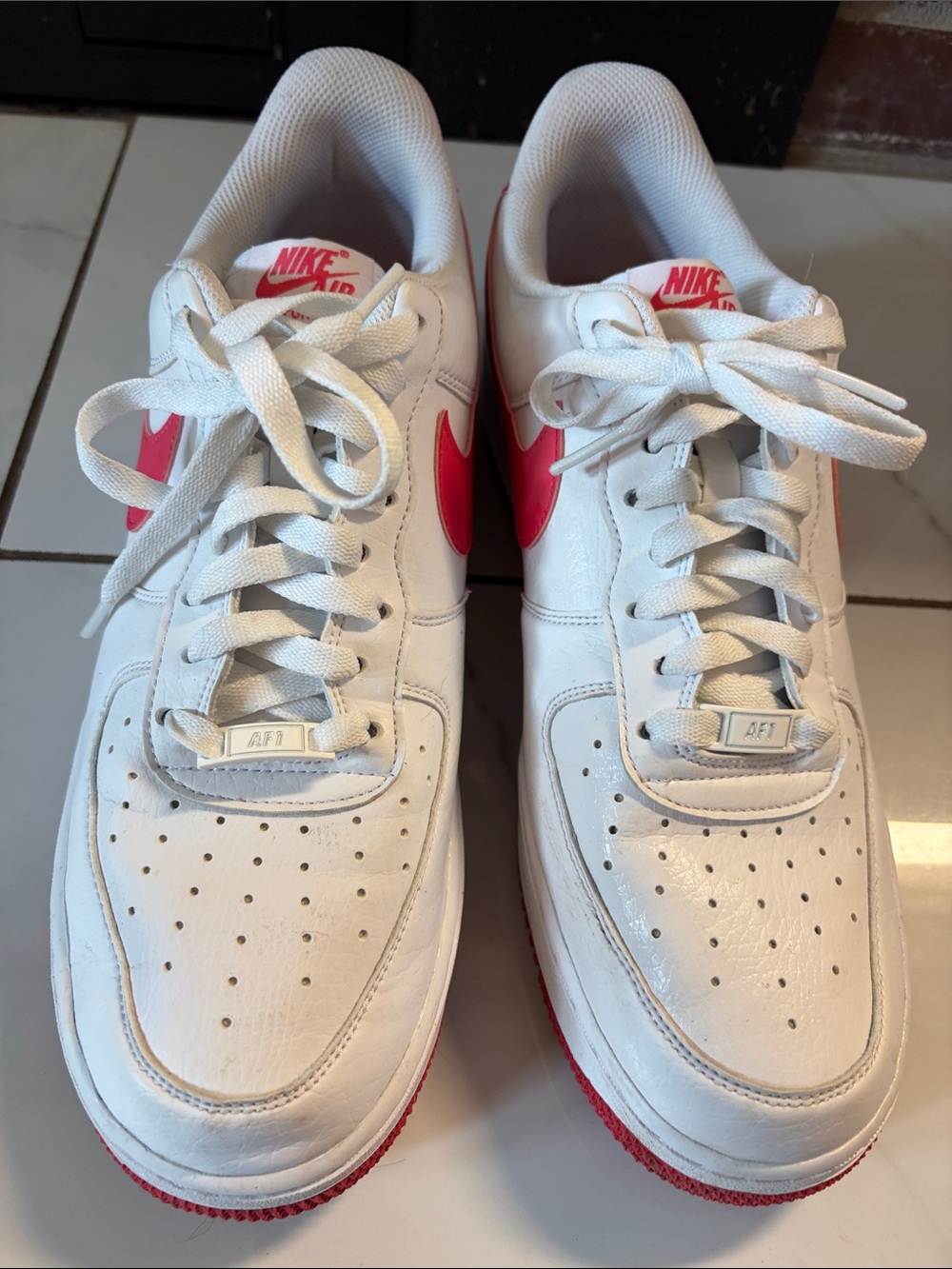 Nike Men’s Low-Top Sneakers — White with Pink Swoosh